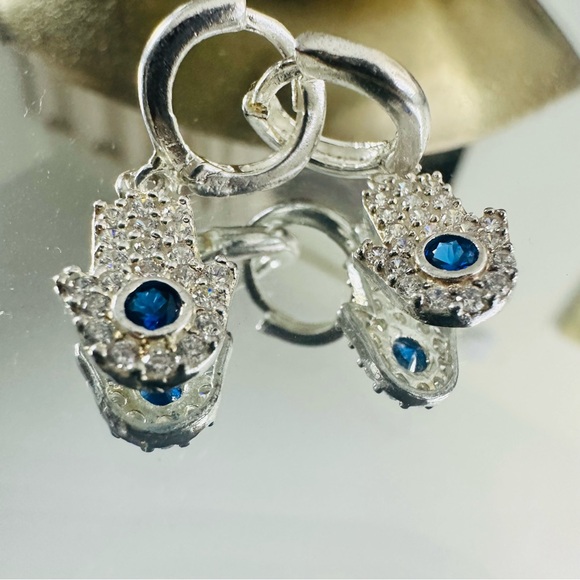 Elegant Silver Hamsa Earrings with Blue Zircon Accents - Picture 5 of 10